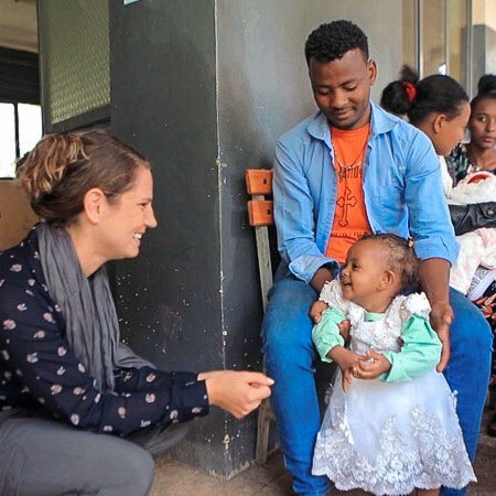 Pharmacist, child and dad in Ethiopia