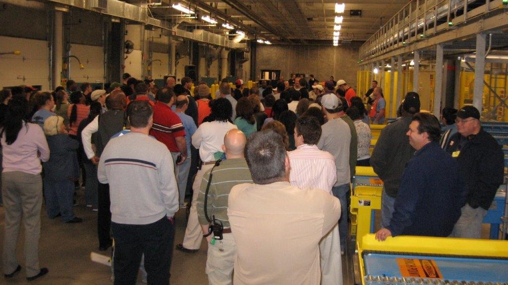 group of people in distribution center