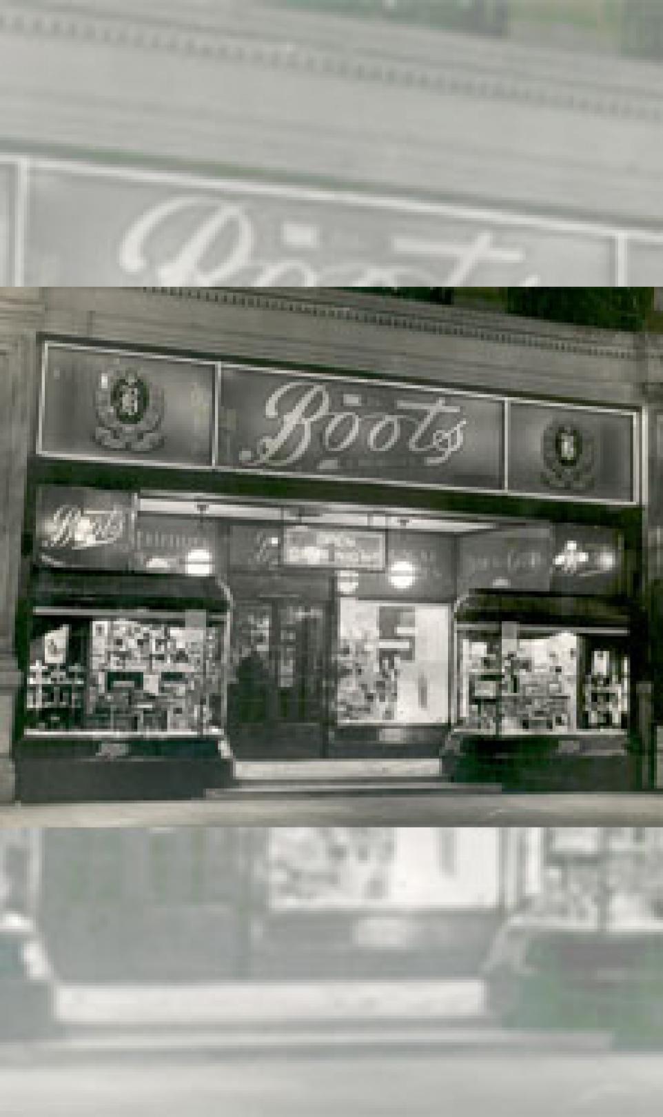 Storefront black and white photograph of the first Boots store in Goose Gate, Nottingham, UK