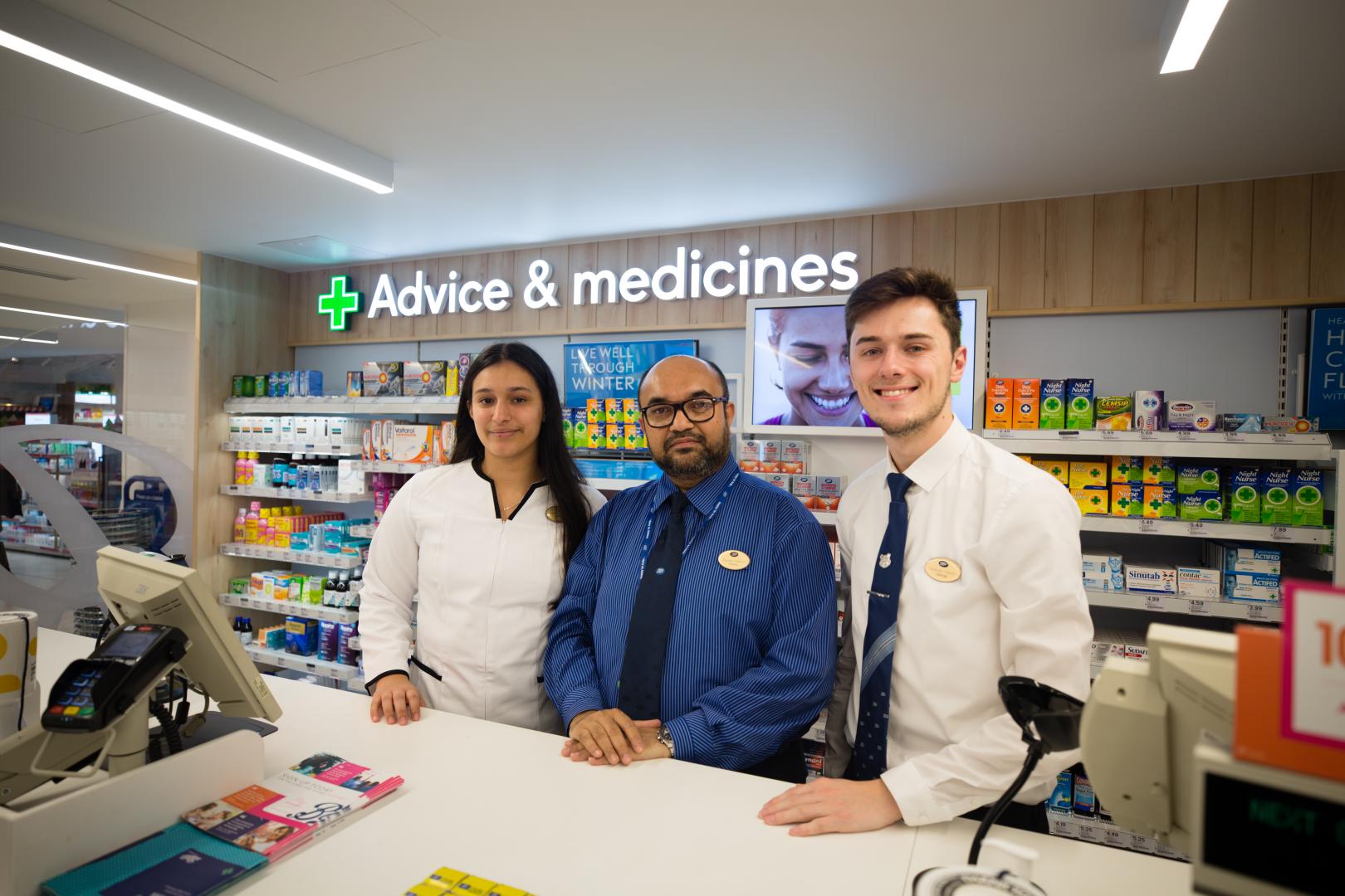 Boots opticians and pharmacists at checkout counter