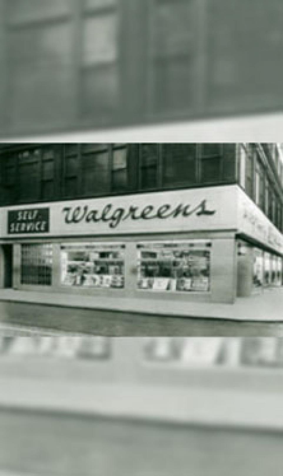 Storefront black and white photograph of a Walgreens self-service store