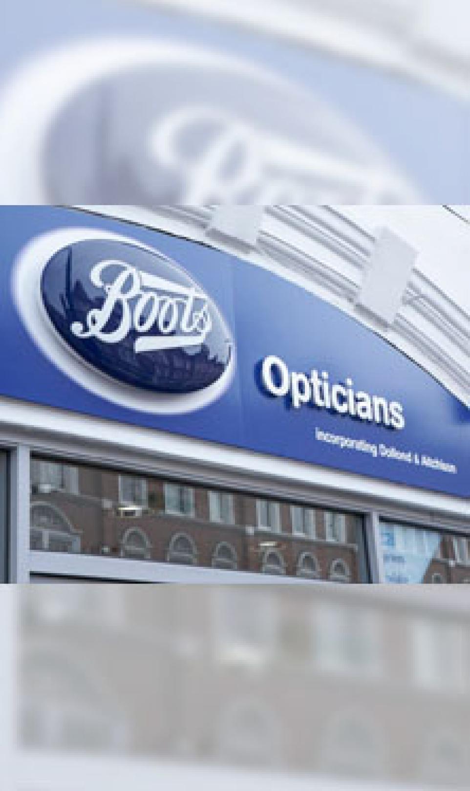 Close-up of a Boots Opticians sign at the front of a UK store