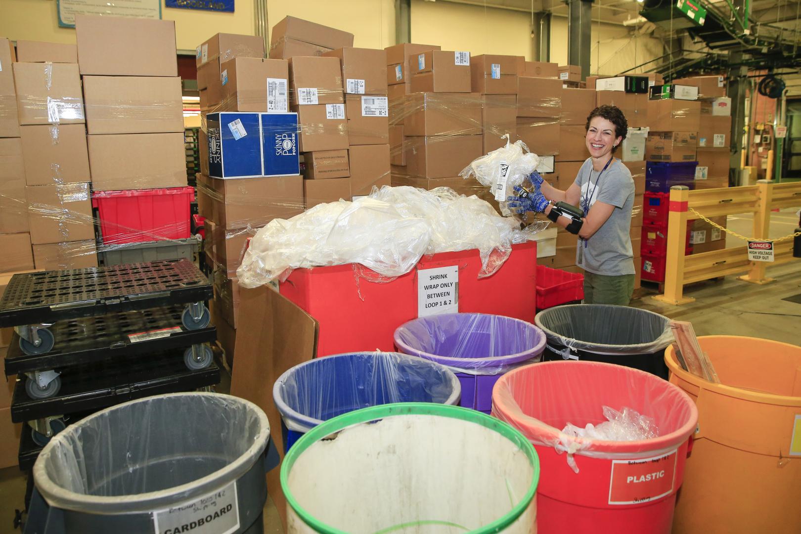WBA employee sorting recycled waste