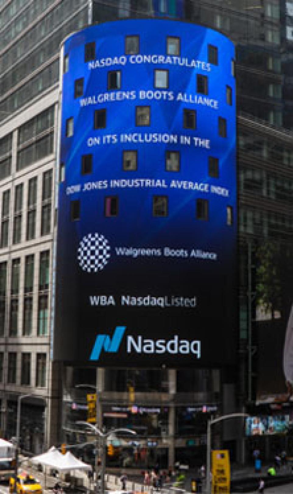 Advertisement on a building showing that Walgreens Boots Alliance has joined the Dow Jones Industrial Average
