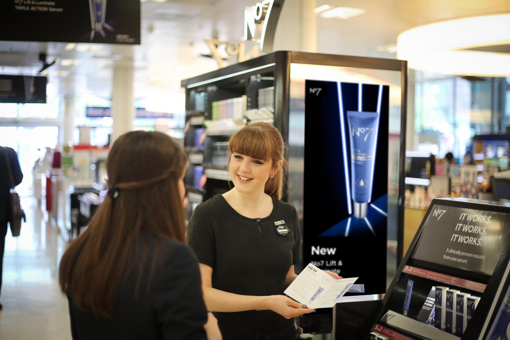 Boots Beauty Advisor talking to customer