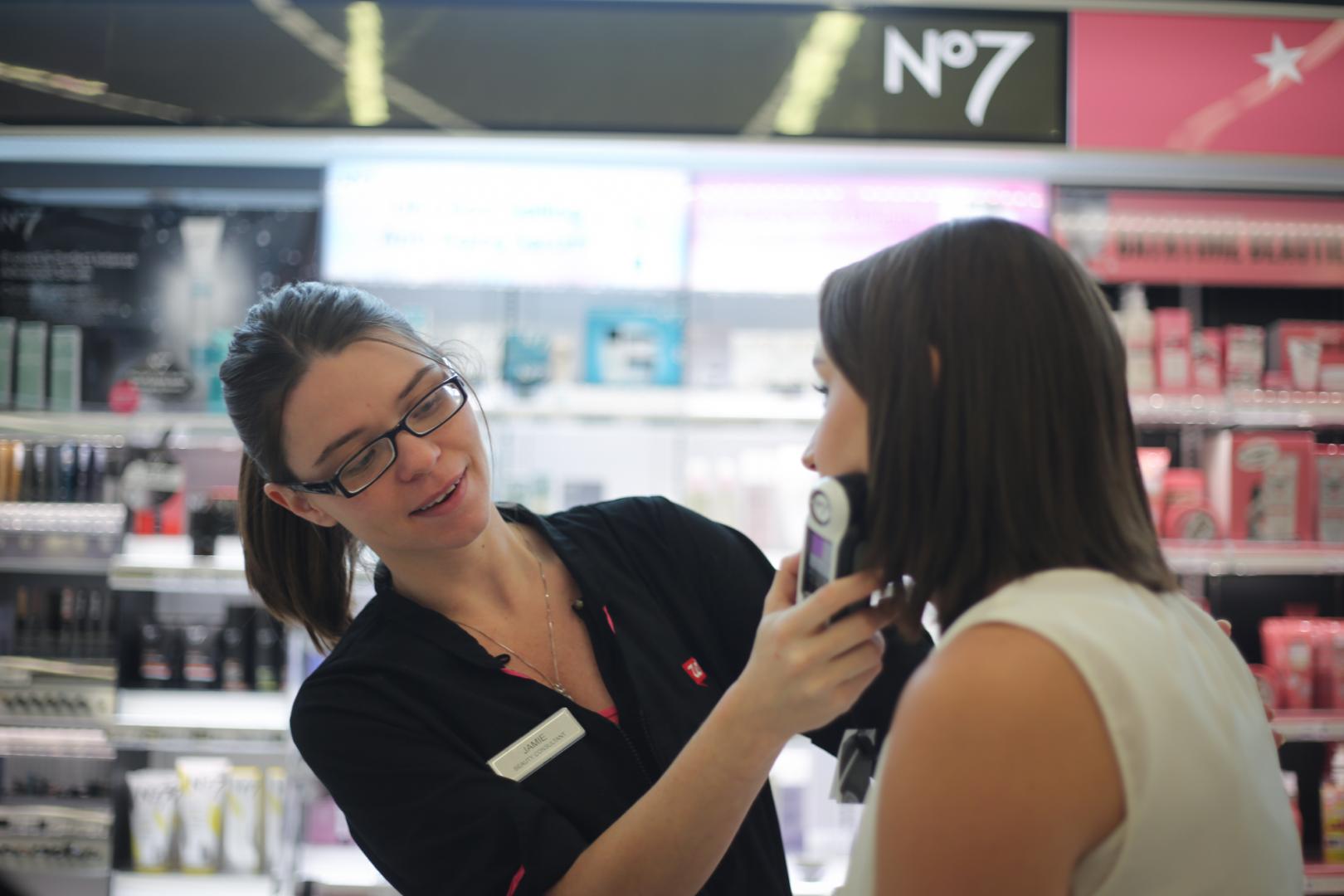 Walgreens Beauty Consultant with customer