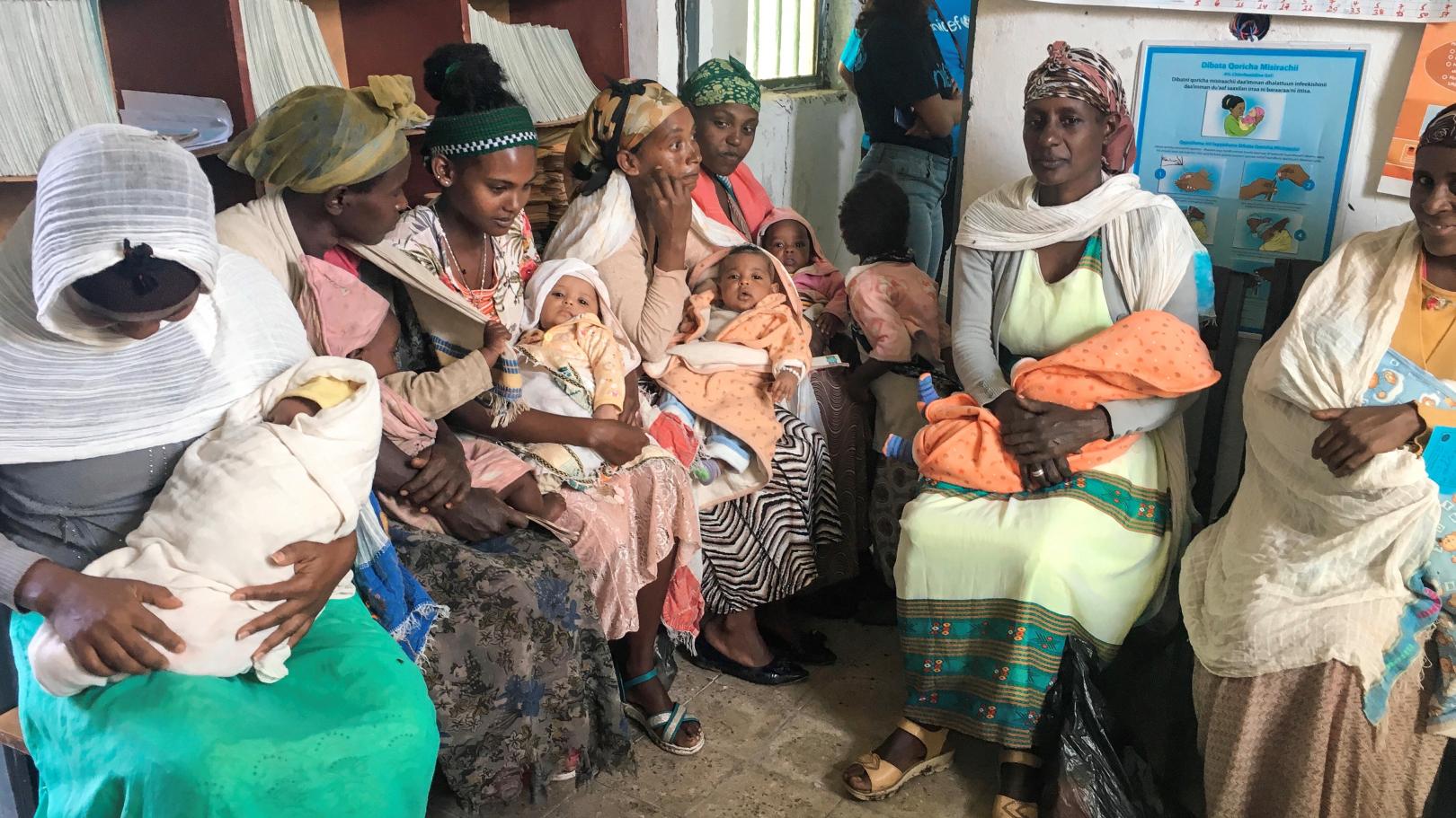 Mothers wait for their babies to receive vaccinations at a rural health post in Chalaba Silassie, Ethiopia.