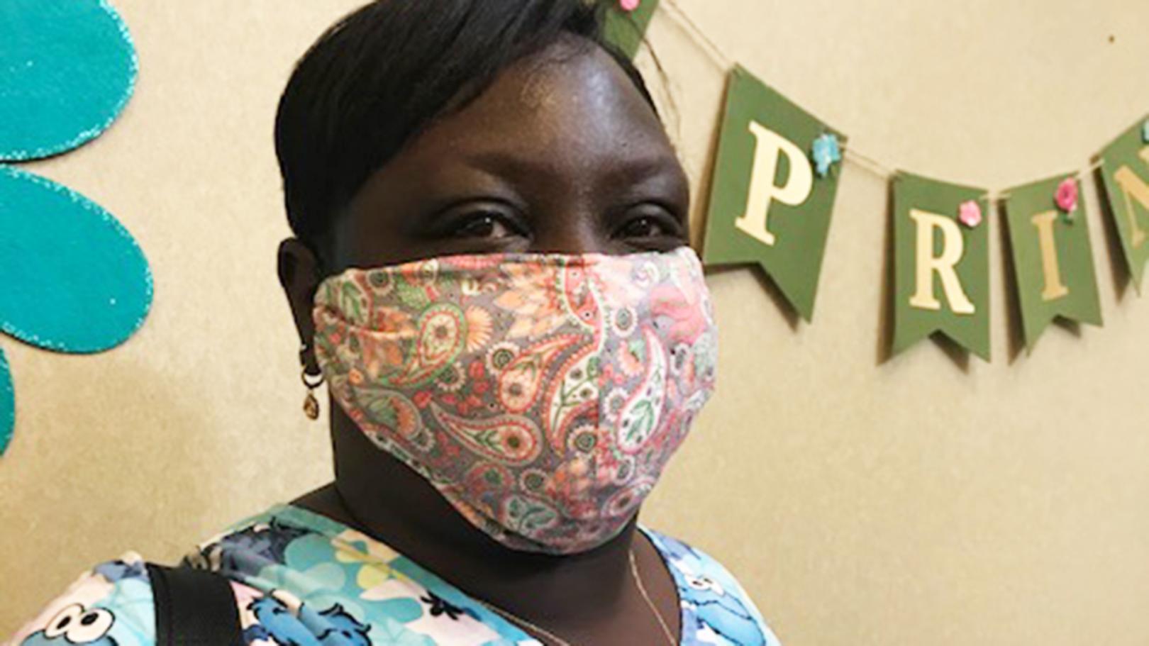Woman wearing one of the face masks donated to health care workers