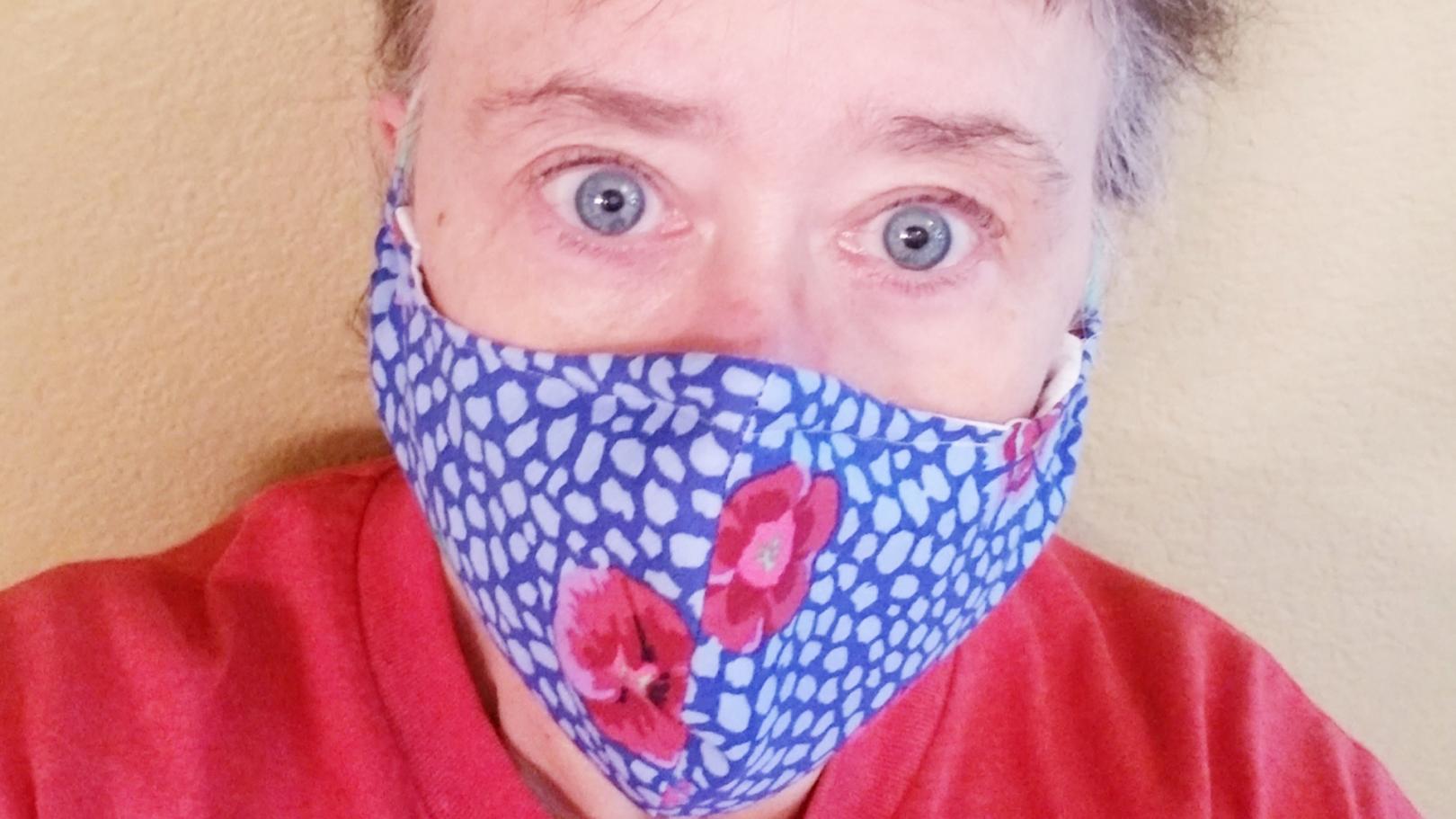 Woman wearing one of the face masks donated to health care workers