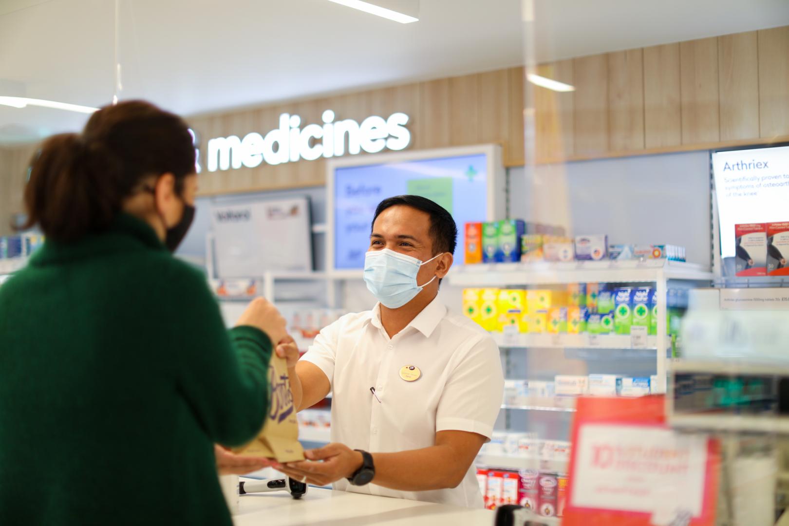 Boots Pharmacist with Patient
