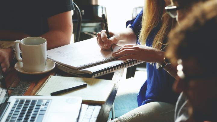 Writing in a notebook