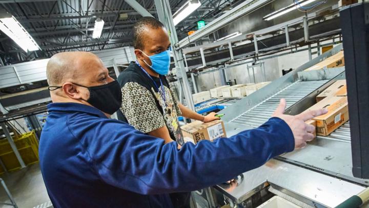 two men working in distribution center