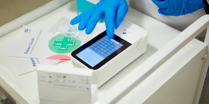 Hand holding a testing device