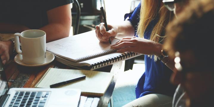 Writing in a notebook