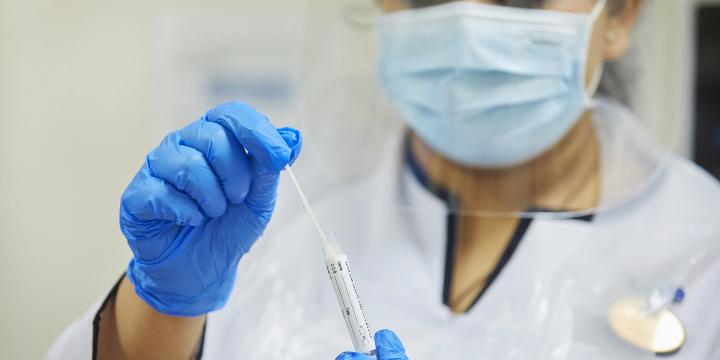 Boots Pharmacist wearing PPE