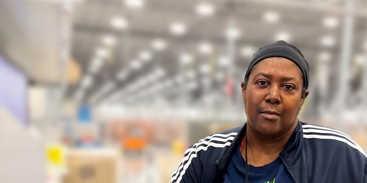 warehouse team member at computer