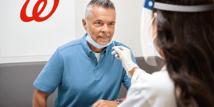 Patient prepares to receive test from pharmacist