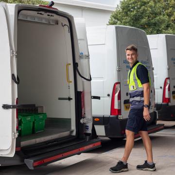 Alliance Healthcare driver walking towards an Alliance Healthcare van