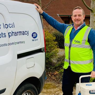 James in front of his van