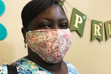 Woman wearing one of the face masks donated to health care workers